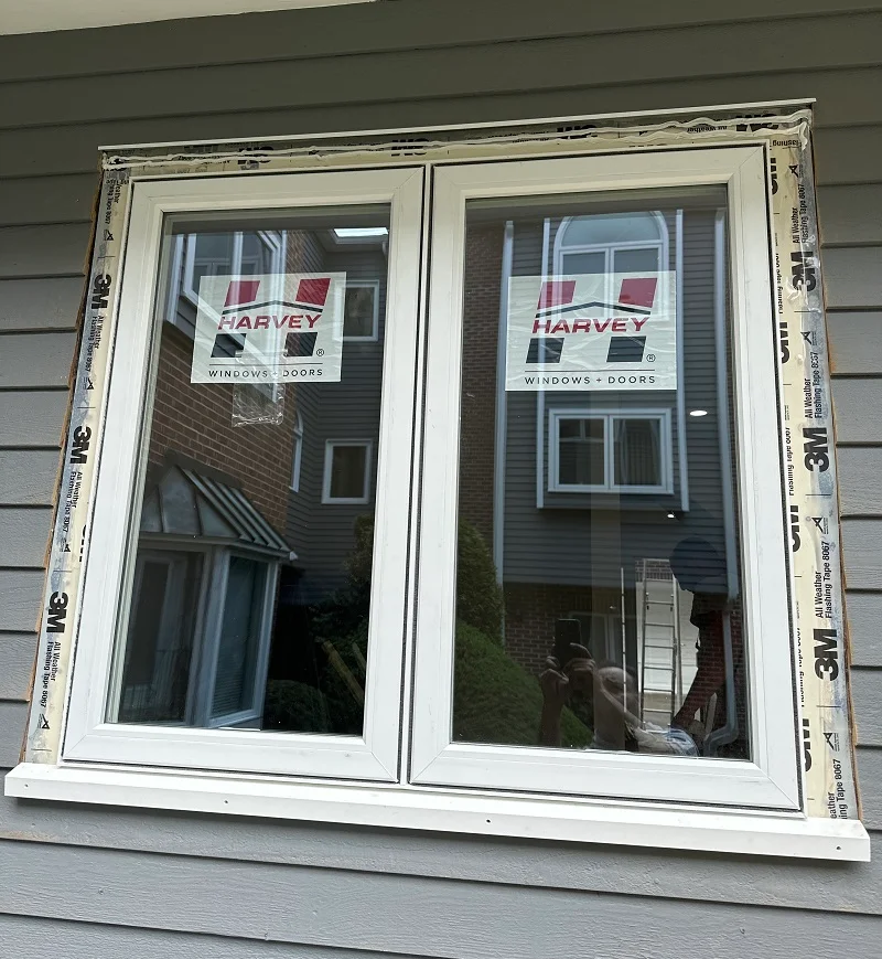 Taped and insulated windows waiting to be finished